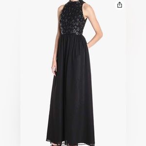 Gorgeous Adrianna Papell black dress with faux leather flowers and crystals.